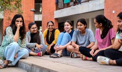 Students interacting with their dorm parents.