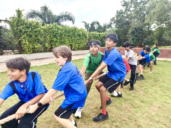 Students play tug-of-war.
