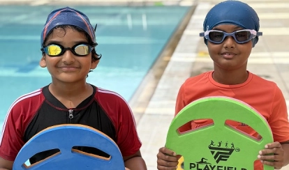 A student using the swimming pool.
