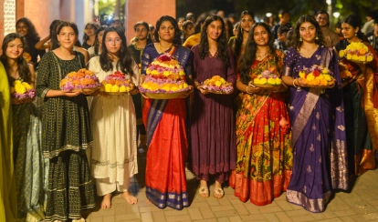 Students and staff celebrating Bathukamma, a local tradition.