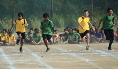 Students playing basketball. 