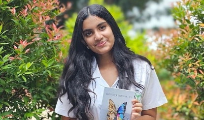 Grade 9 student Tamaara with her published book.