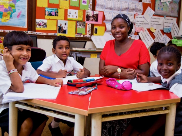 Junior School students in a classroom with a teacher. 