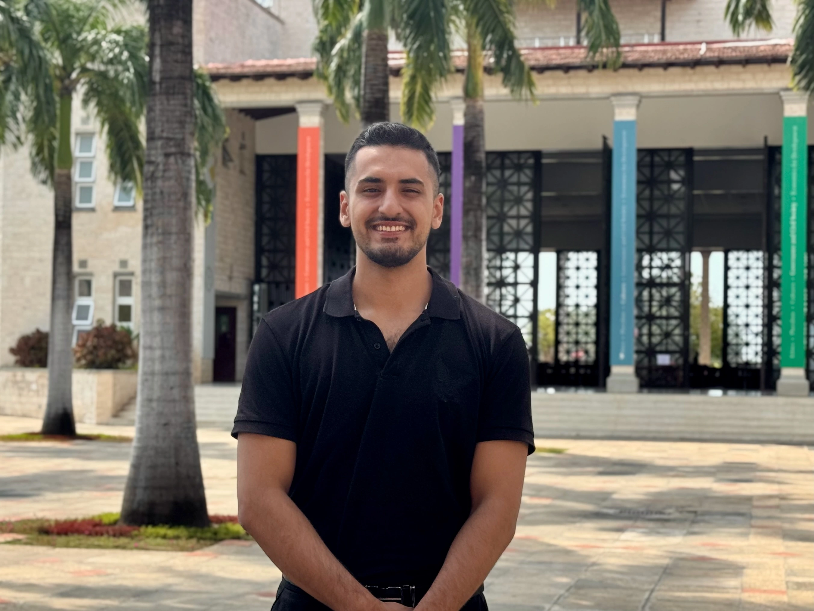  Junior School teacher standing in the playground
