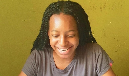 Namirembe Nnaggenda doing an online internship.