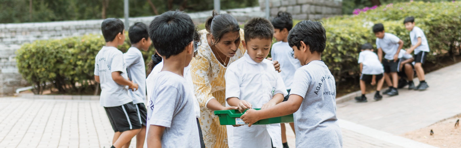 Junior School students studying living organisms.