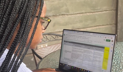Tia Mbabazi doing an online internship.