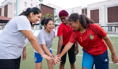 Students bonding before a game.