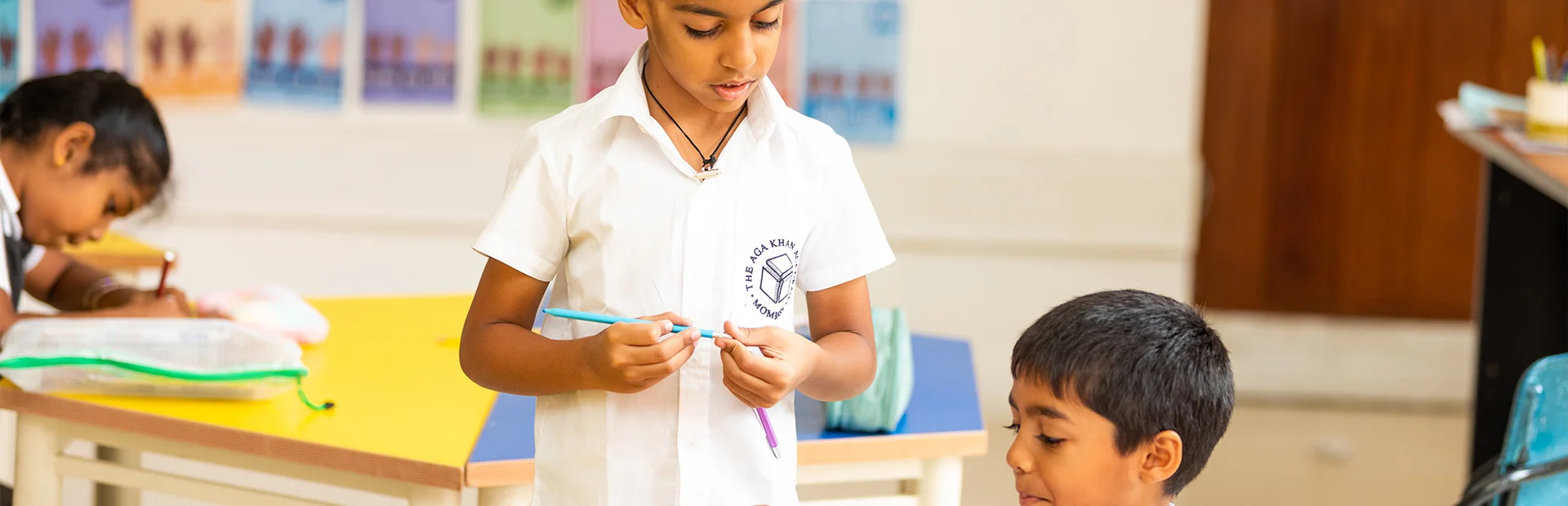 Two Junior School students working together on a project.